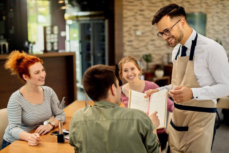 New customer enjoy their visit to a local restaurant, having discovered it through strong SEO results that made the business visible online.
